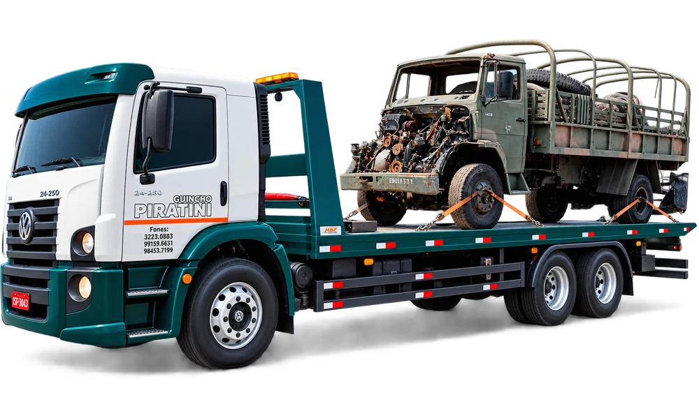 Caminhão plataforma da Guinchos Piratini transportando veículo pesado